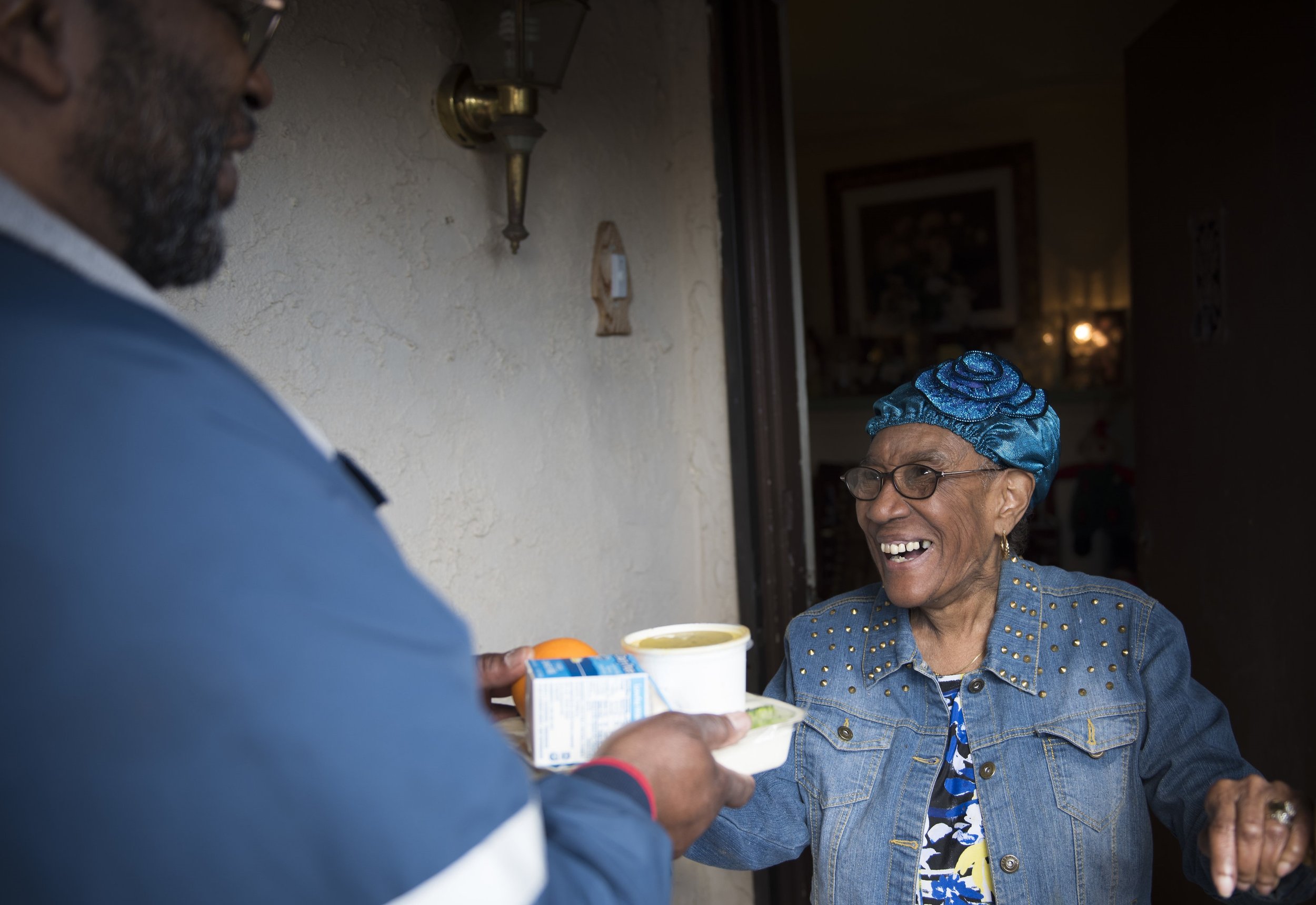 Anne receiving meal cropped.jpg