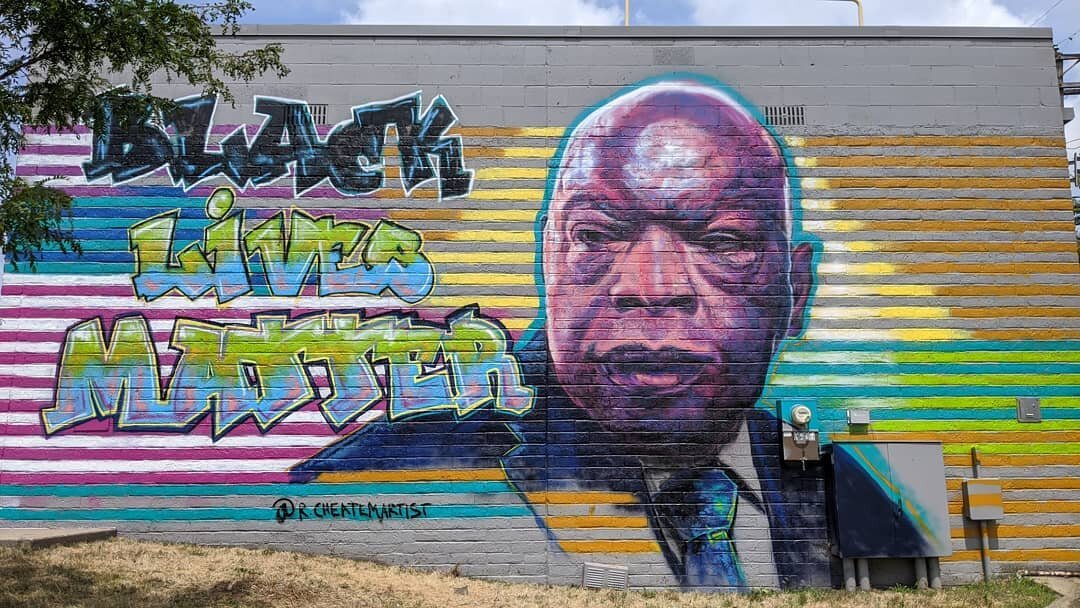Deeply appreciative of @rcheatemartist for coming out this week to create this incredibly beautiful and vibrant tribute to Senator John Lewis. 
Please go out and see it for yourself.  1215 6th Ave. On the south wall of University Laundry.
#SenatorJoh