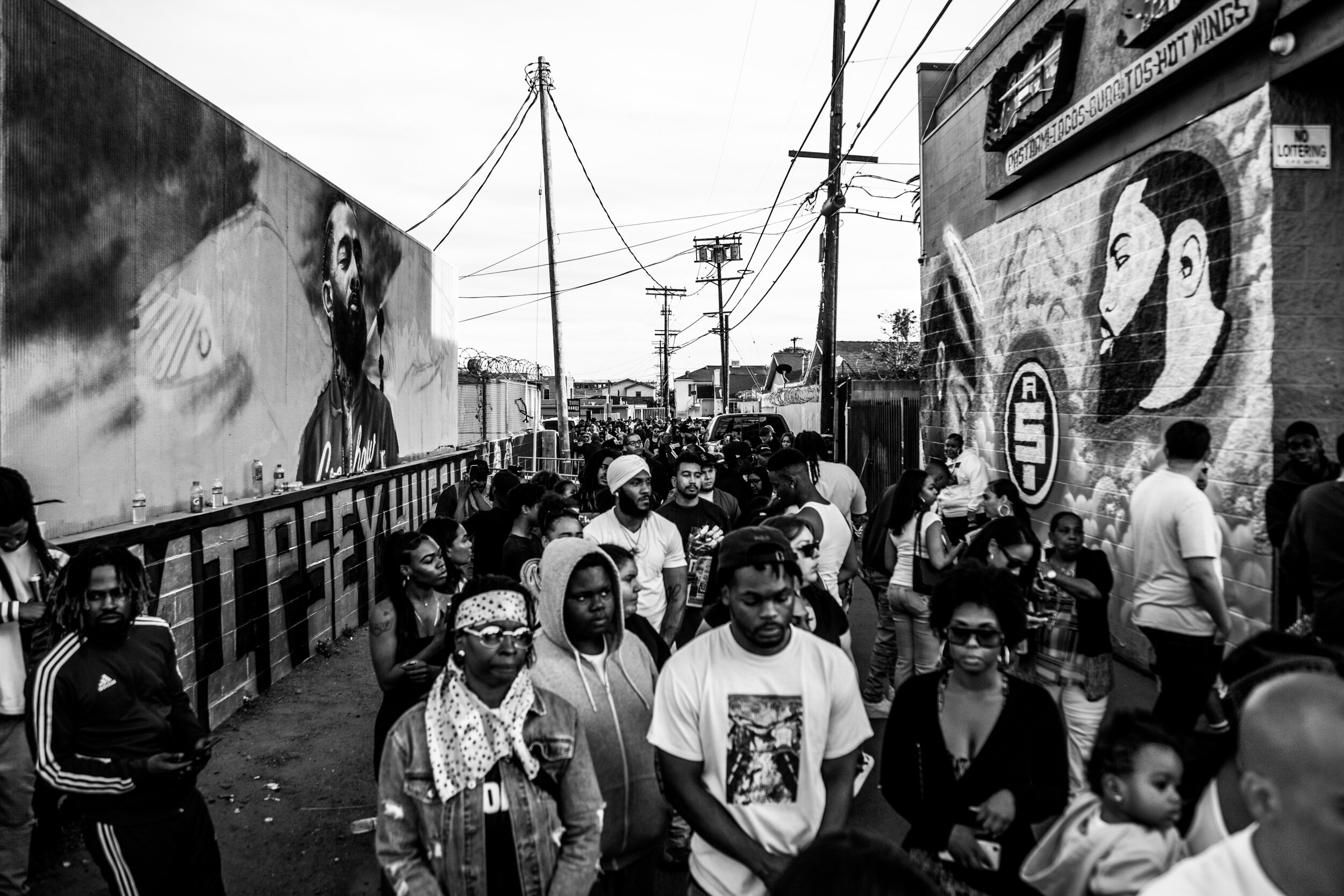  Fans and community members continue to gather at The Marathon Clothing store a week after the death of Nipsey Hussle.  