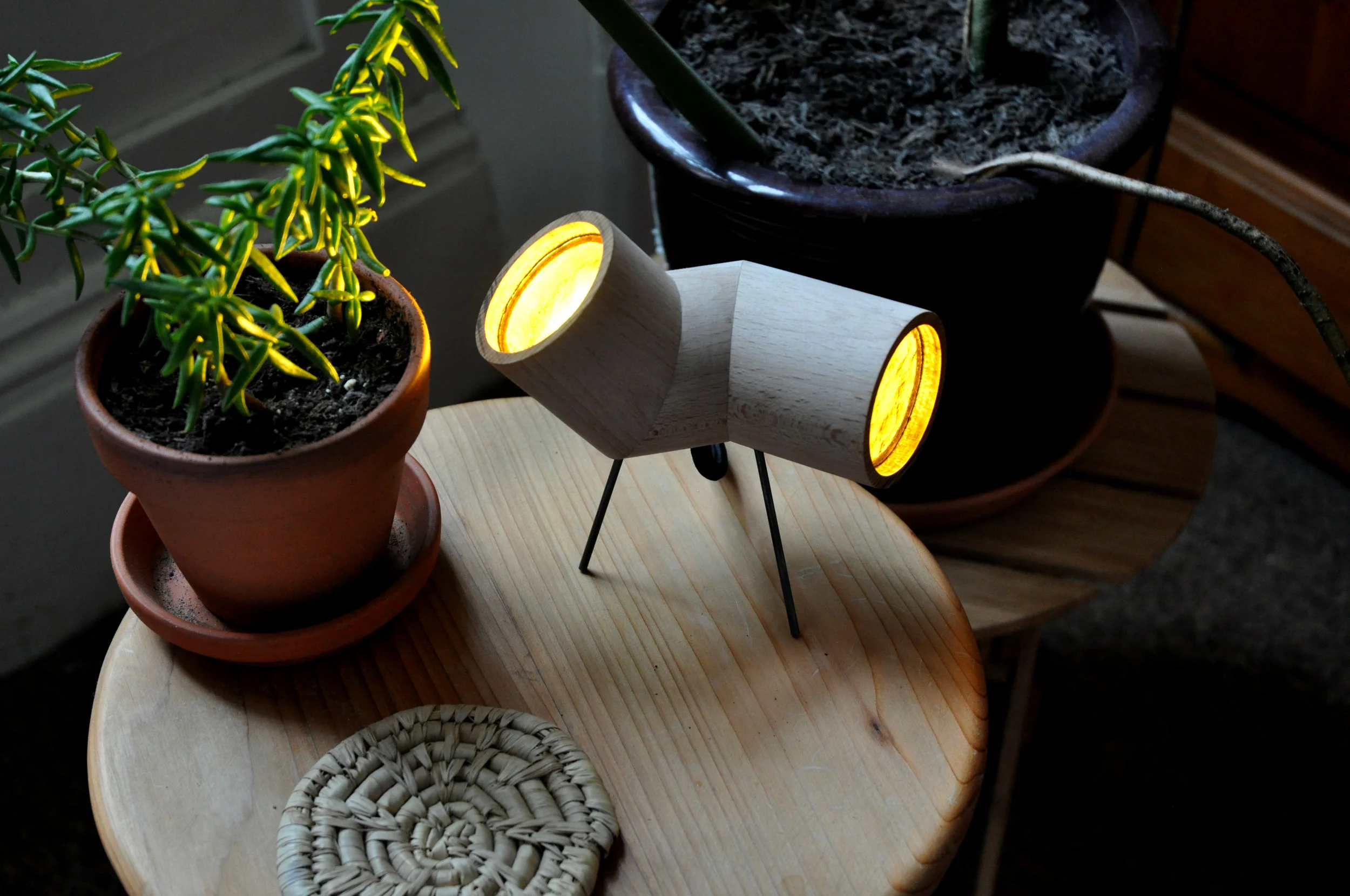 Swimming Tube Lamp | Steamed Beech, Steel, Amber rippled glass. | © Phat Design