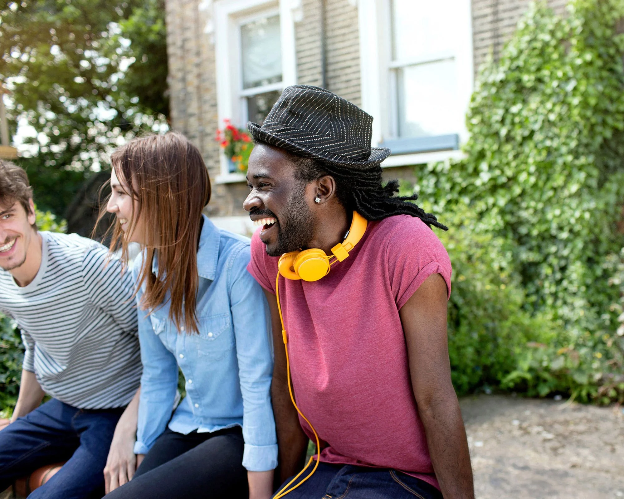 a-group-of-friends-sitting-outside.jpg
