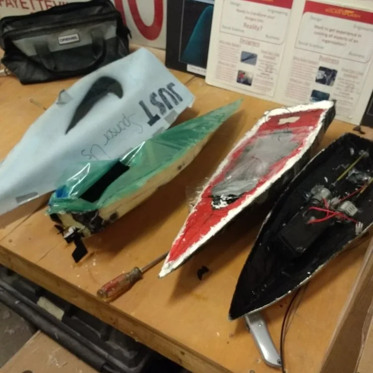 Completed new member projects. Our team’s design is on the right.