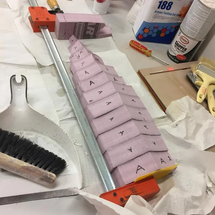 Foam cross sections used to create the mold for the hull. Once the glue dried, we sanded the foam to create a smooth body that could be used for the plaster mold.