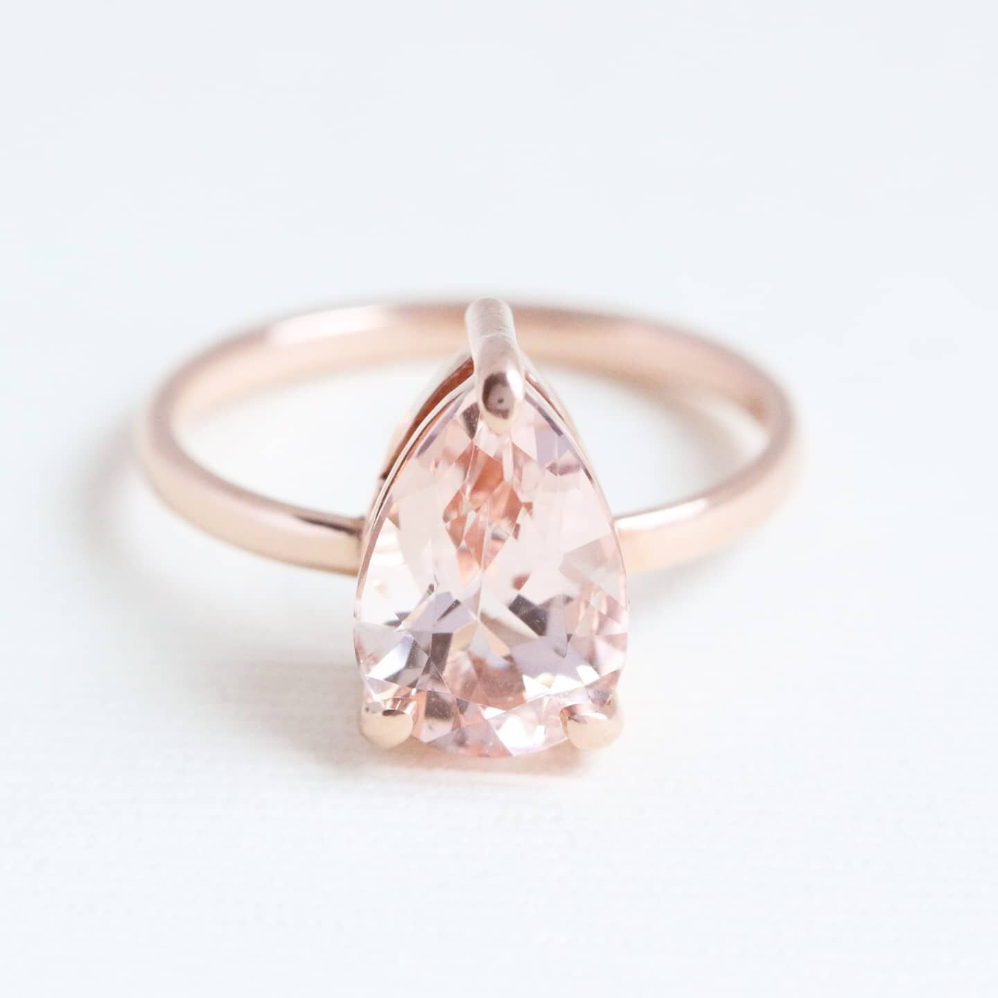 &quot;Keep walking through the storm. Your rainbow is waiting on the other side.&quot; 
- Heather Stillufsen

In this picture: the Princess engagement ring in 14k rose gold and morganite looking like candy 💕