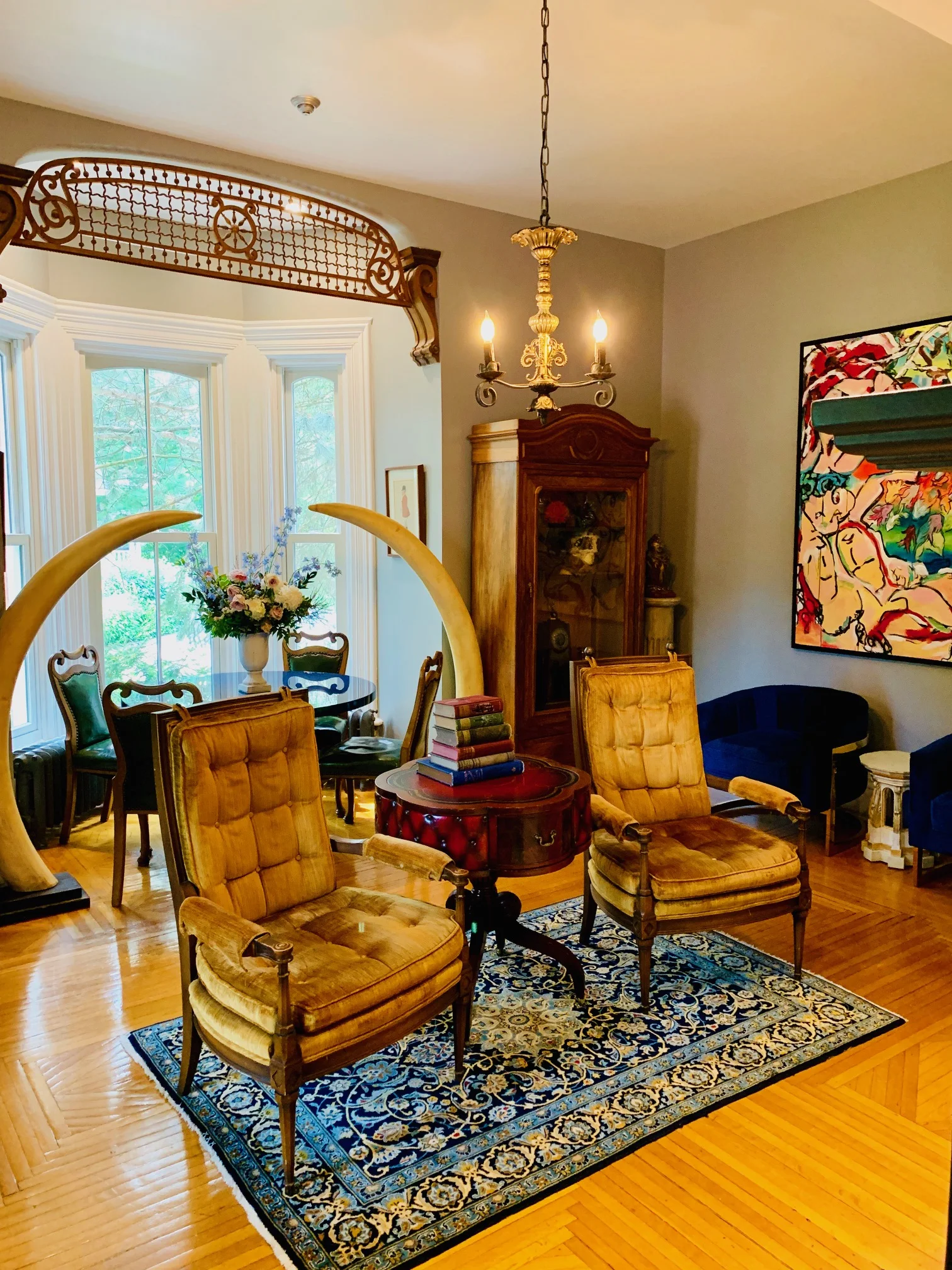 Eco-alert - the sitting room’s dramatic tusks are replicas. The wonderful maple floors are (carefully restored) original.