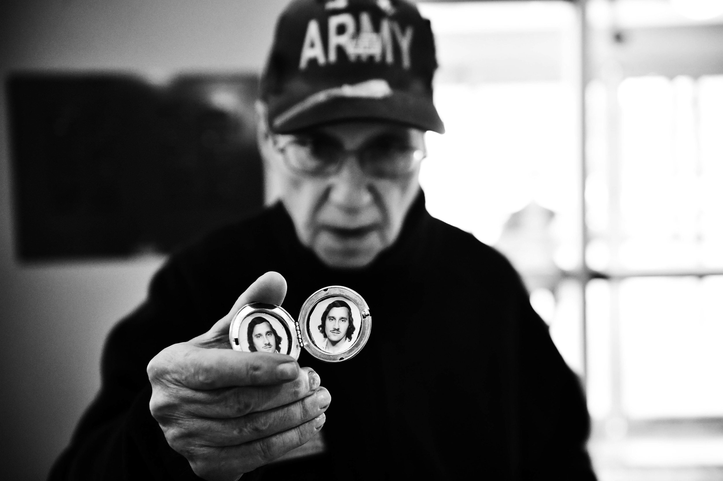  Vietnam veteran Nicholas Borowitz, 69, holds up a photo of himself when he was young in Wilkes-Barre, Pa. 