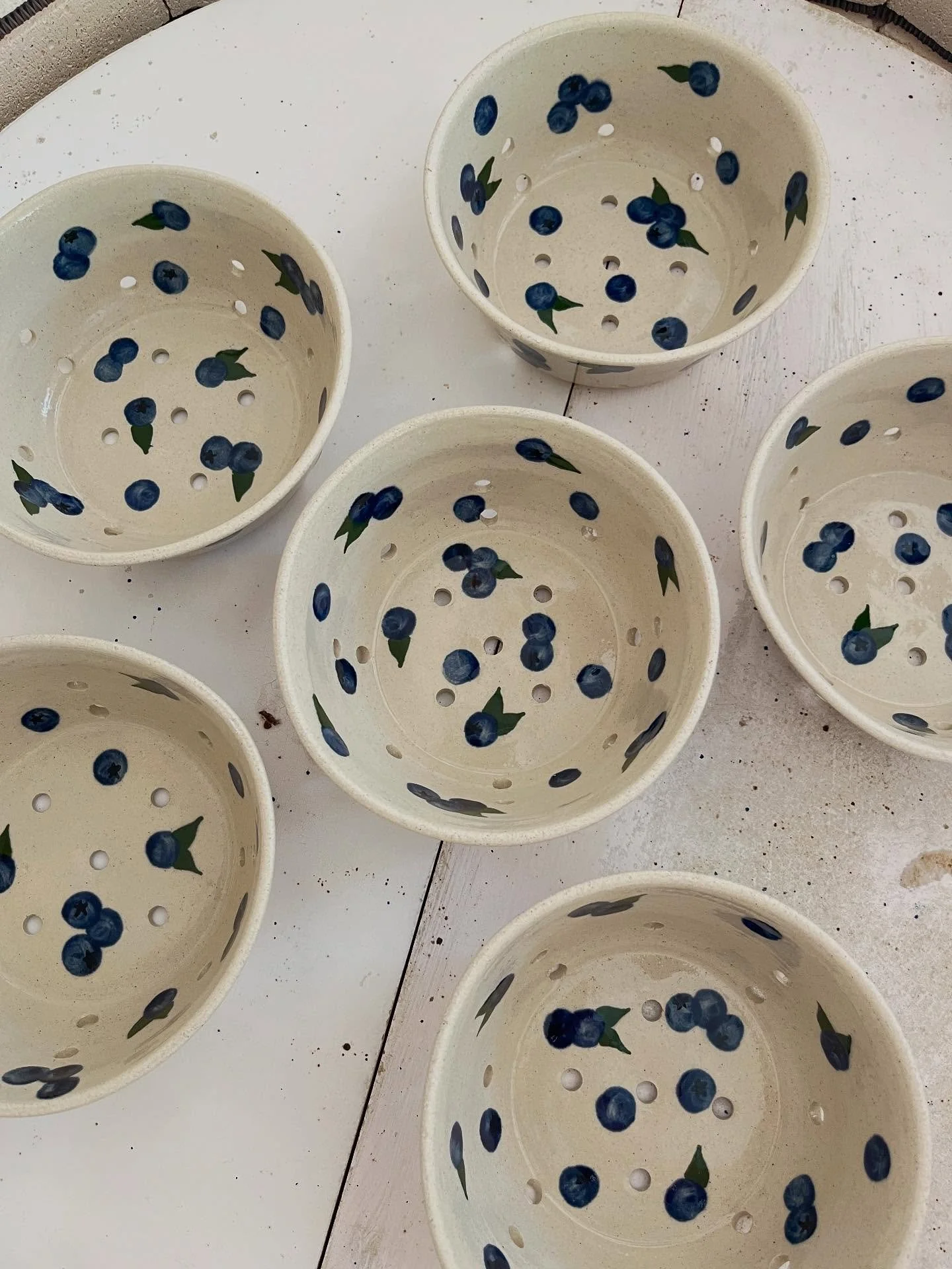 Blueberry 🫐 Colanders! I&rsquo;ve been loving painting these little blue berries on plates, mugs, and colanders lately. 😄