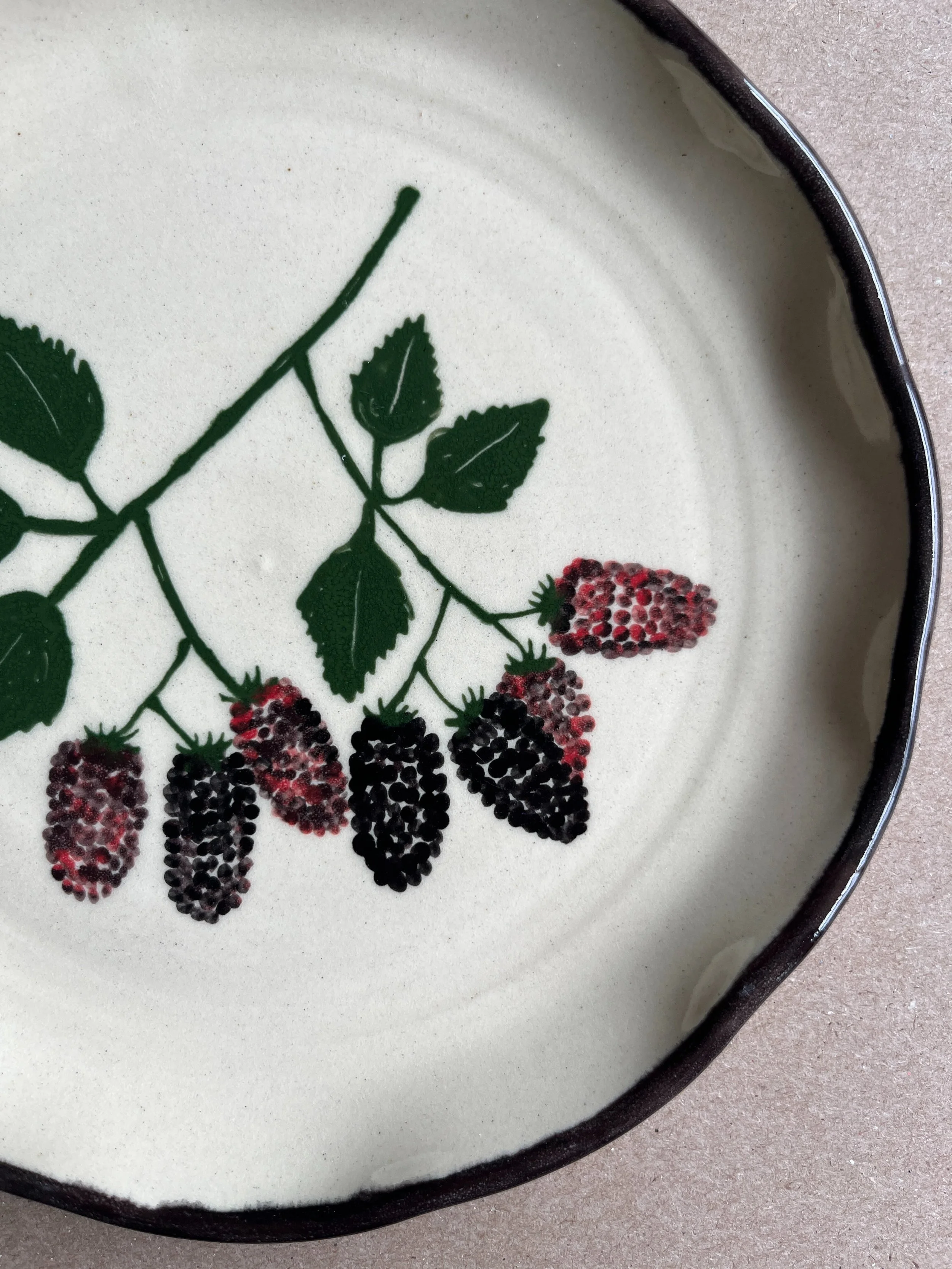 Marionberries have been the theme this past week. Had an order for two mugs and a request for a marionberry cake so I went ahead and made the plate already! Super thrilled with how it turned out. Available for order on our website by tomorrow. ✌🏻

L