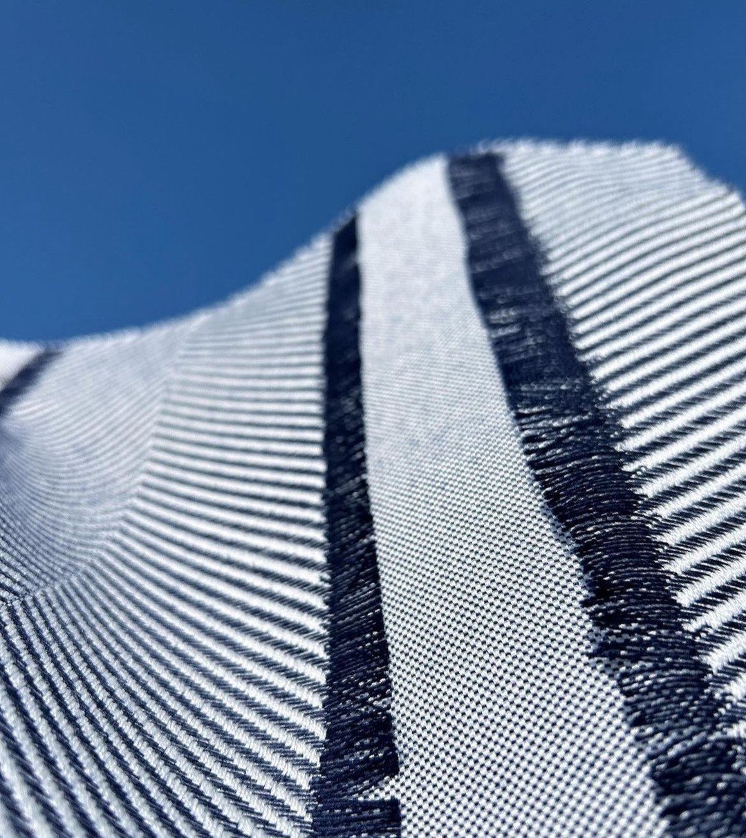 Franja Brazil Navy from @tatizeasyliving is the perfect indoor/outdoor fabric. It&rsquo;s the ideal combo of pattern and texture. #thecravecollective #outdoor #outdoorfabric #performancefabric #fabric