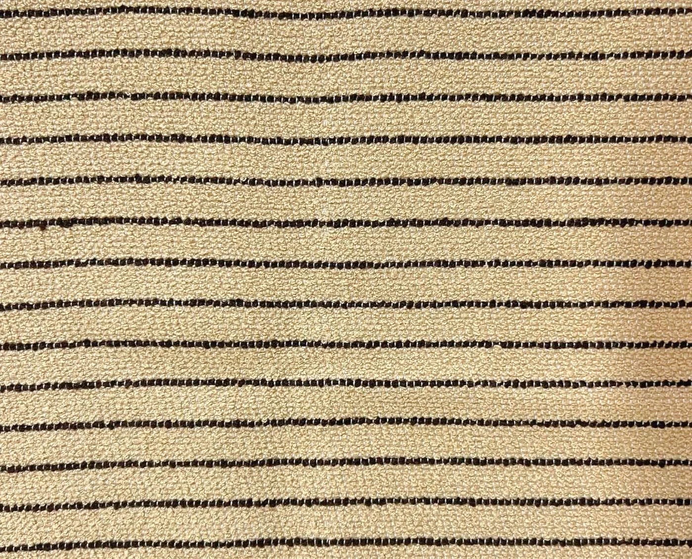 Captain Bege/Marrom from @tatizeasyliving is a textured pin stripe woven with a mix of boucle yarns for a rich structure that resembles hand woven fabrics produced with hand spun yarns. DM me for samples.  #thecravecollective #outdoorfabric #outdoorl