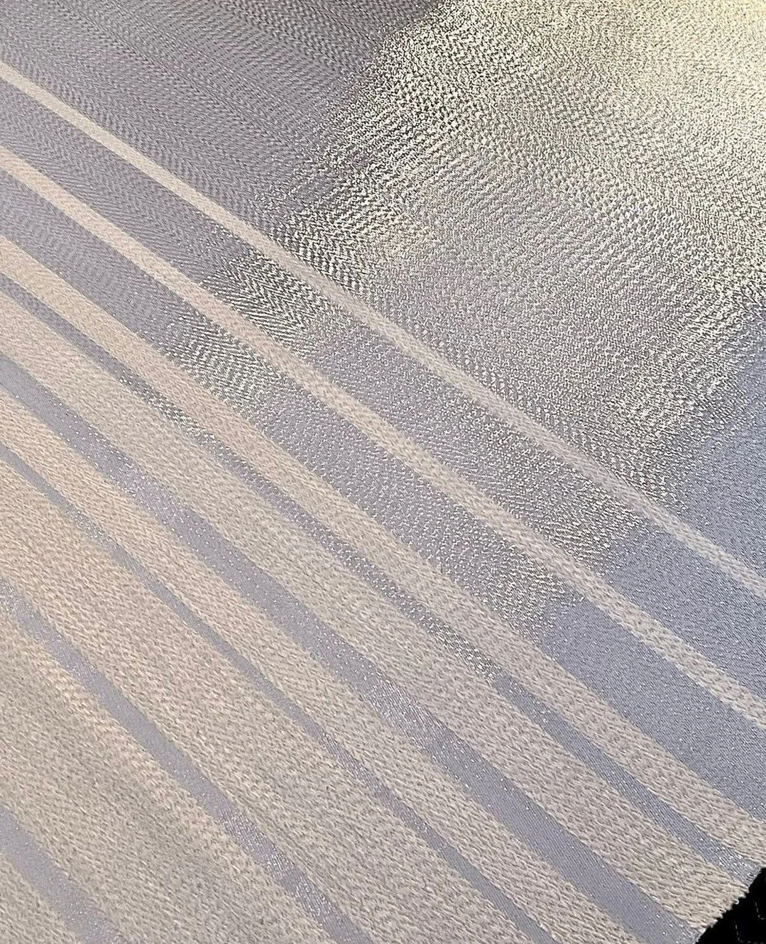 Winter glow from @dougallpaulson. This 15 foot high weaving incorporates almost 6 Ib of handspun bamboo fiber!! It is a blend of bright white and silver jewelry wire. A true labor of love!  #thecravecollective #art #color #artwork #weaving