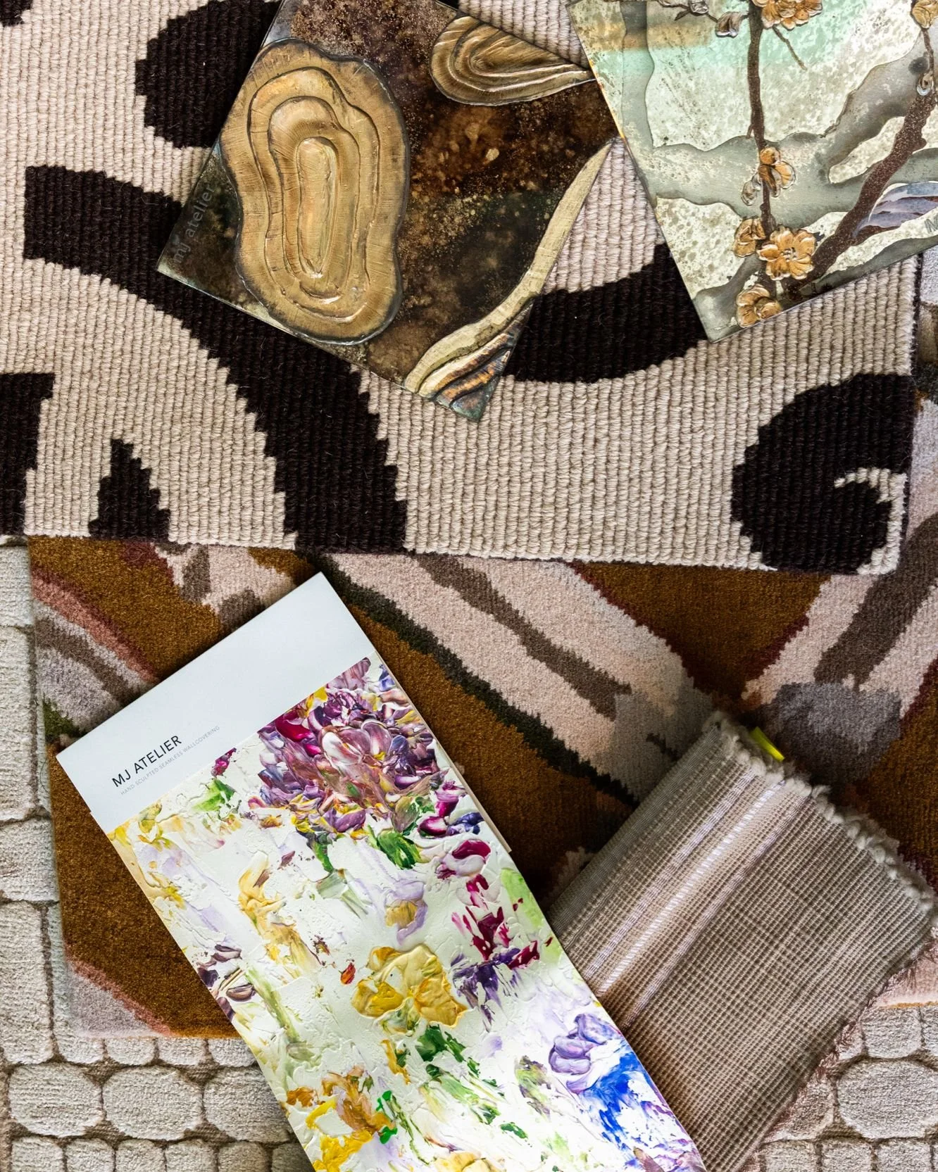 Warm browns with just a hint of color. Featuring @lamanufacturecogolinofficiel, @mjatelier, and @dougallpaulson.  #thecravecollective #textiles #color #handmade #weaving