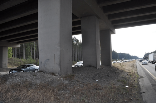 Earth berm under I-5 overpass.