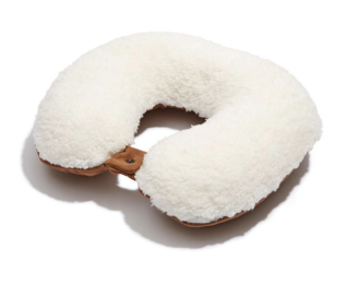 white neck pillow in your carry on