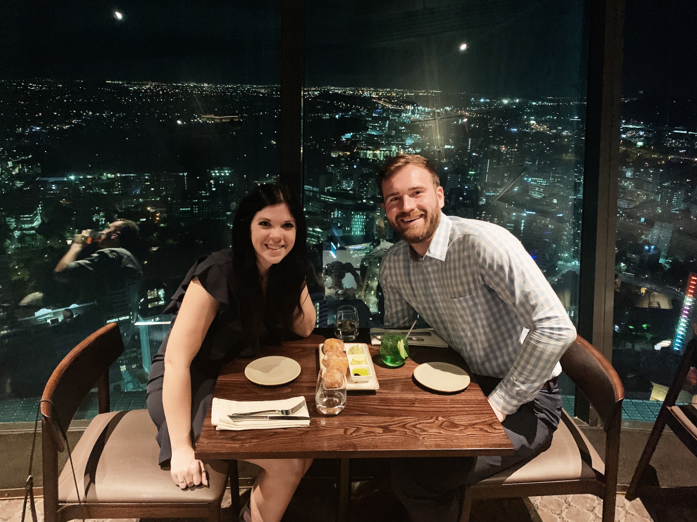 couple eating at Sky Twoer one of the best places to eat in Auckland