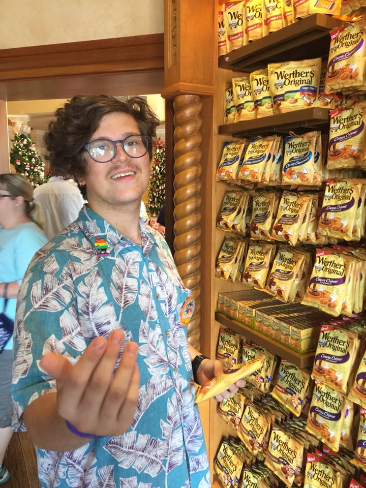 person getting a snack in DISNEY WORLD IN THE SPRING