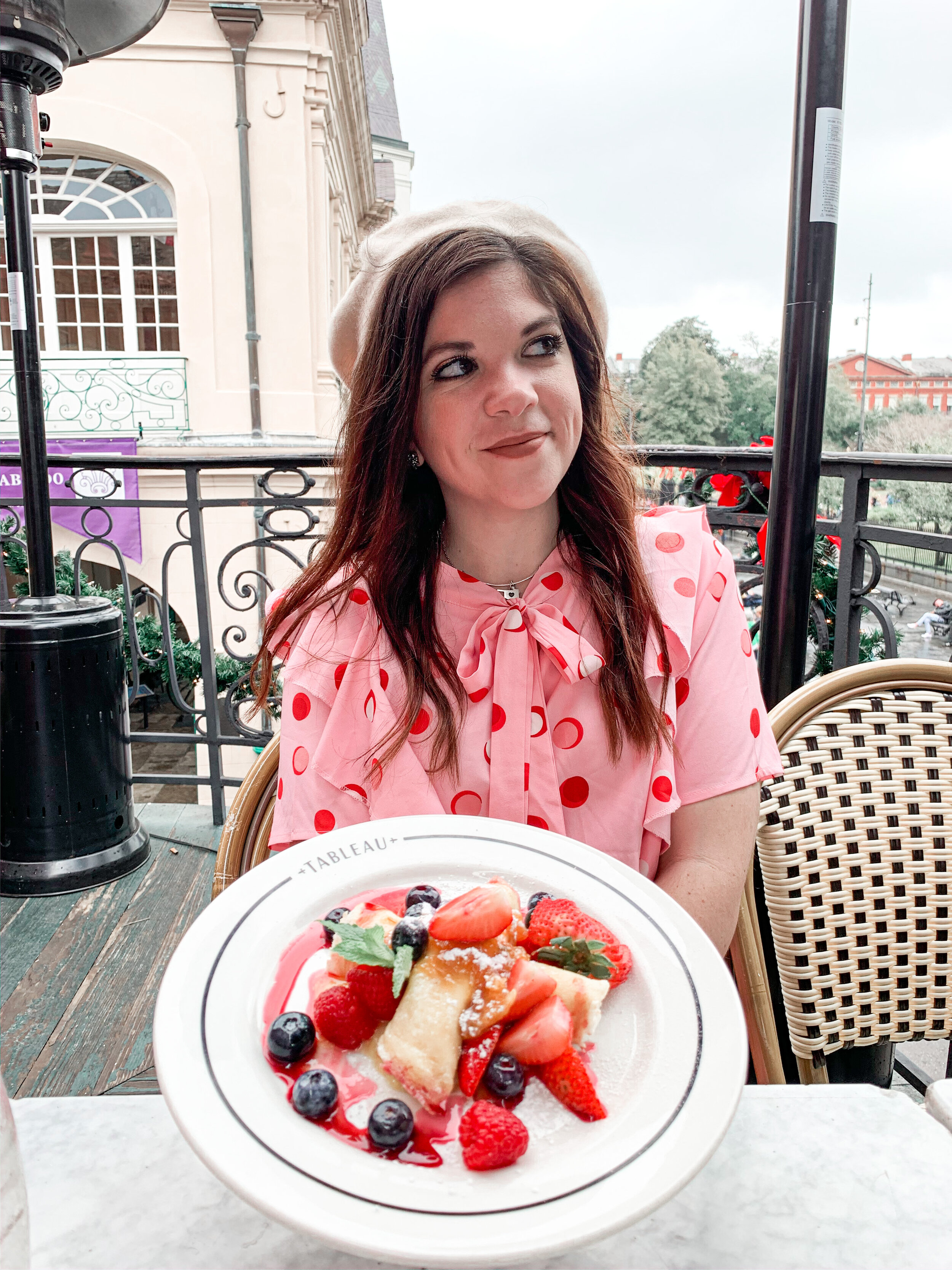 woman eating dessert in New Orleans restaurant