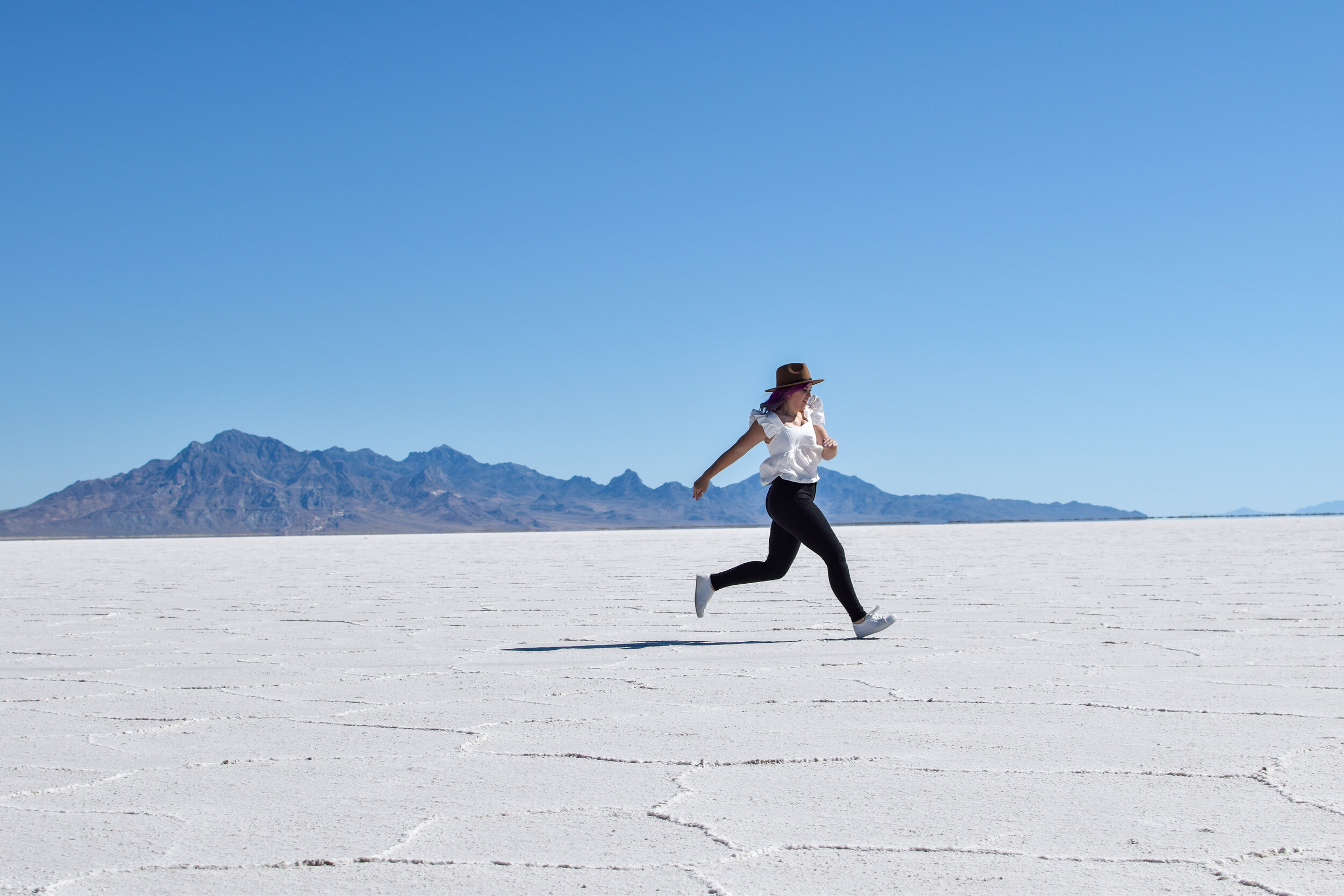woman running in the BONNEVILLE SALT FLATS 