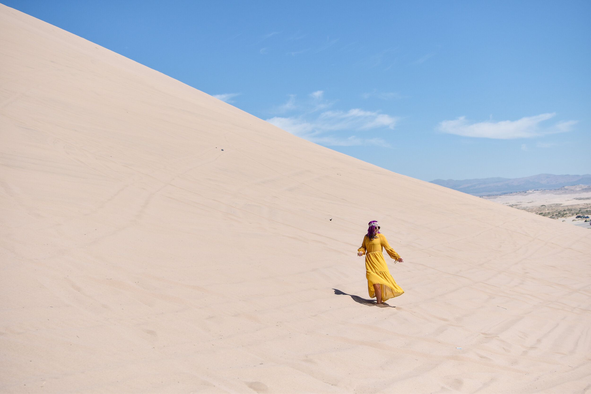 woman walking in the LITTLE SAHARA SAND DUNES