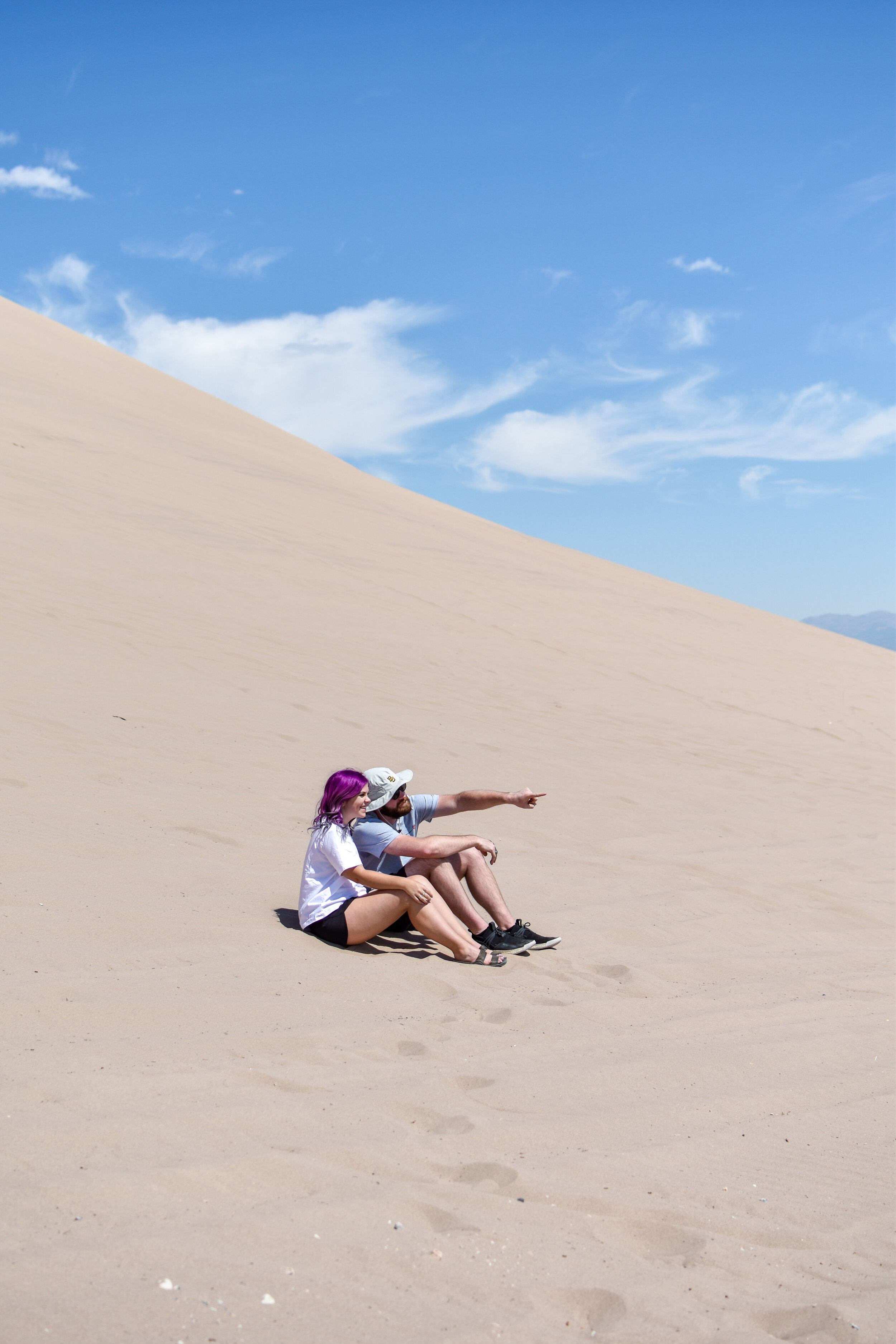 man and woman at the LITTLE SAHARA SAND DUNES