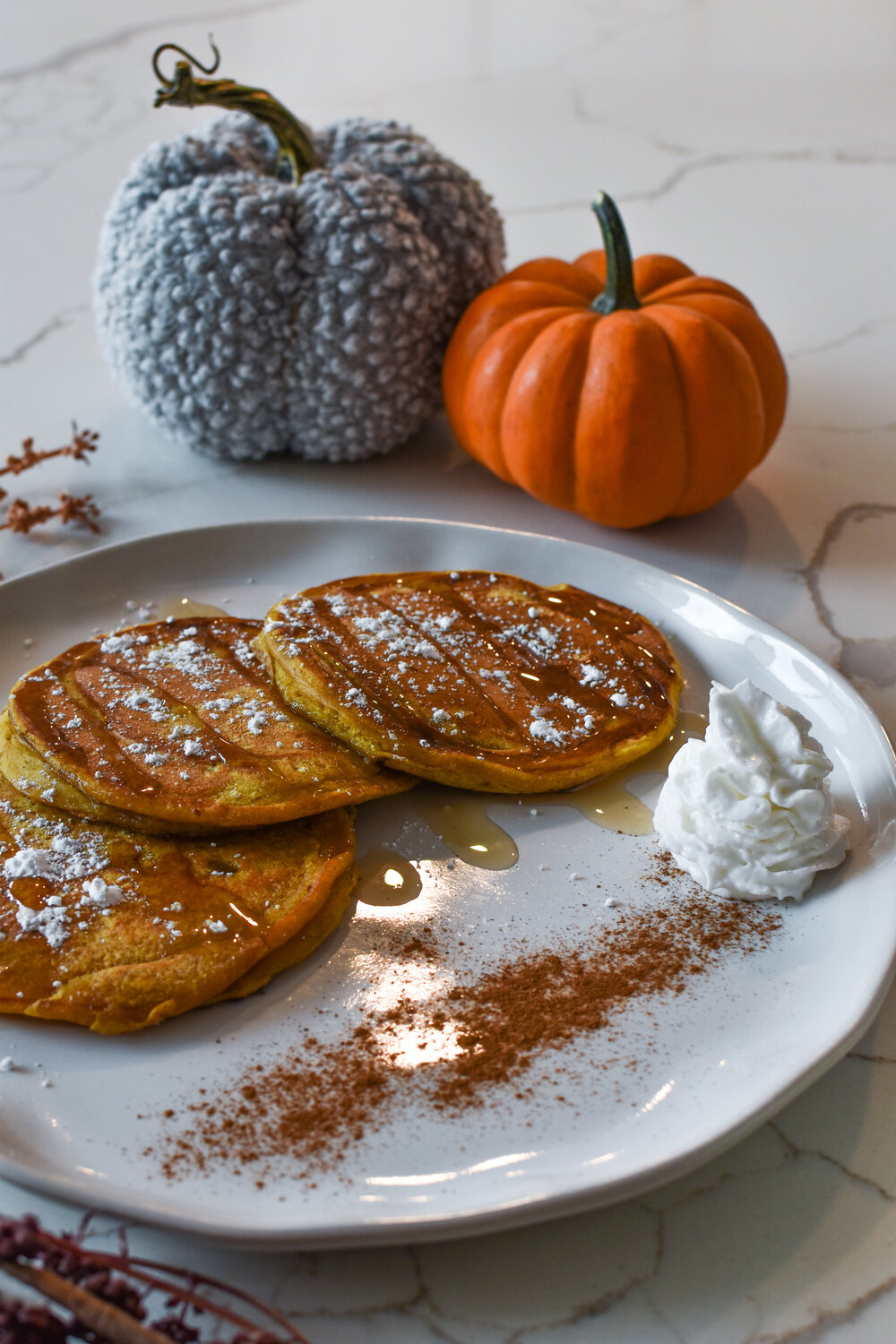 pumpkin spice pancakes on a plate
