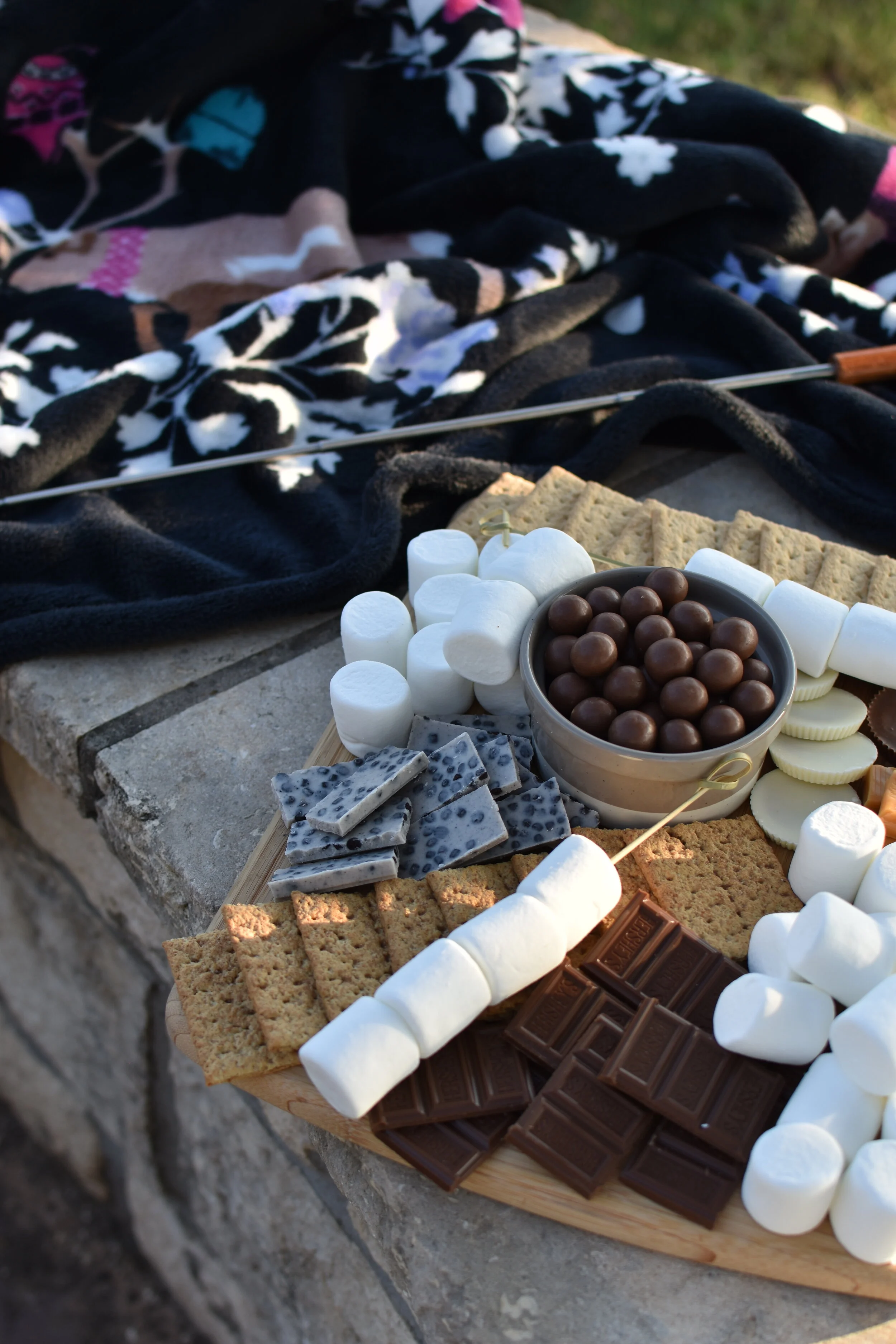 s'mores board closeup of marshmallows and chocolates