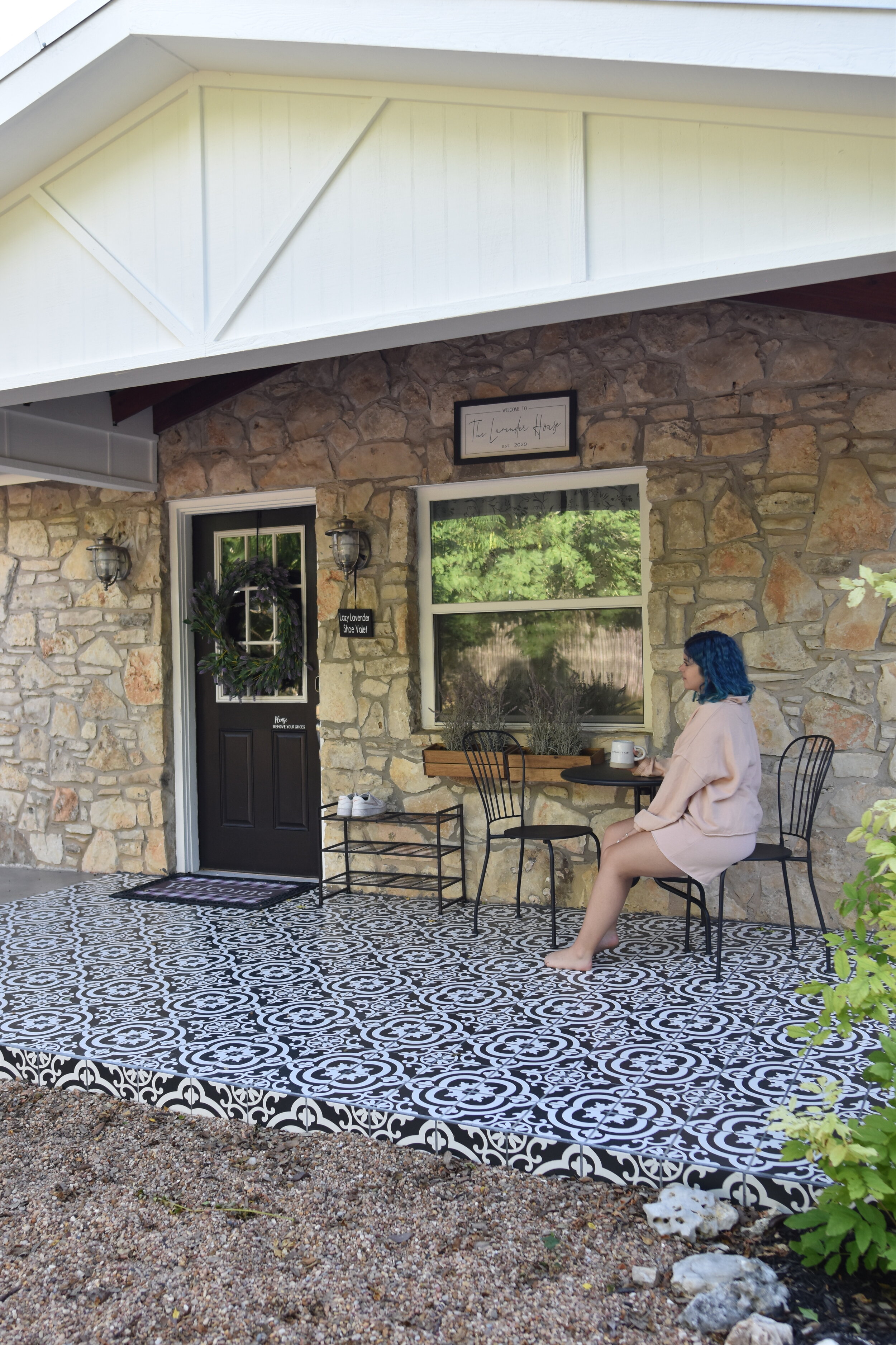 woman sitting outside The Lazy Lavender House in  WIMBERLEY, TEXAS
