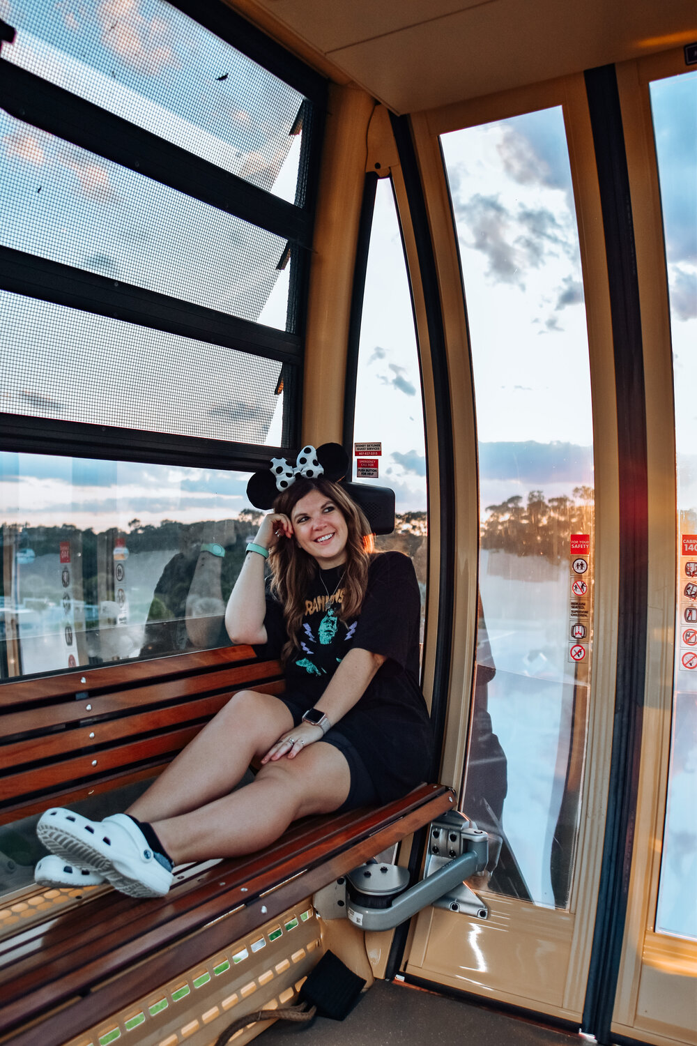 woman sitting and celebrating Halloween at Disney World