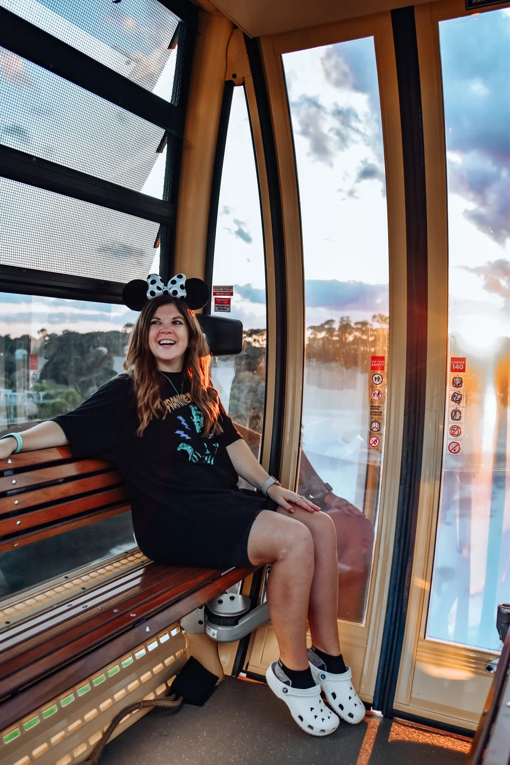 woman in black shirt and cycling shorts celebrating Halloween at Disney World