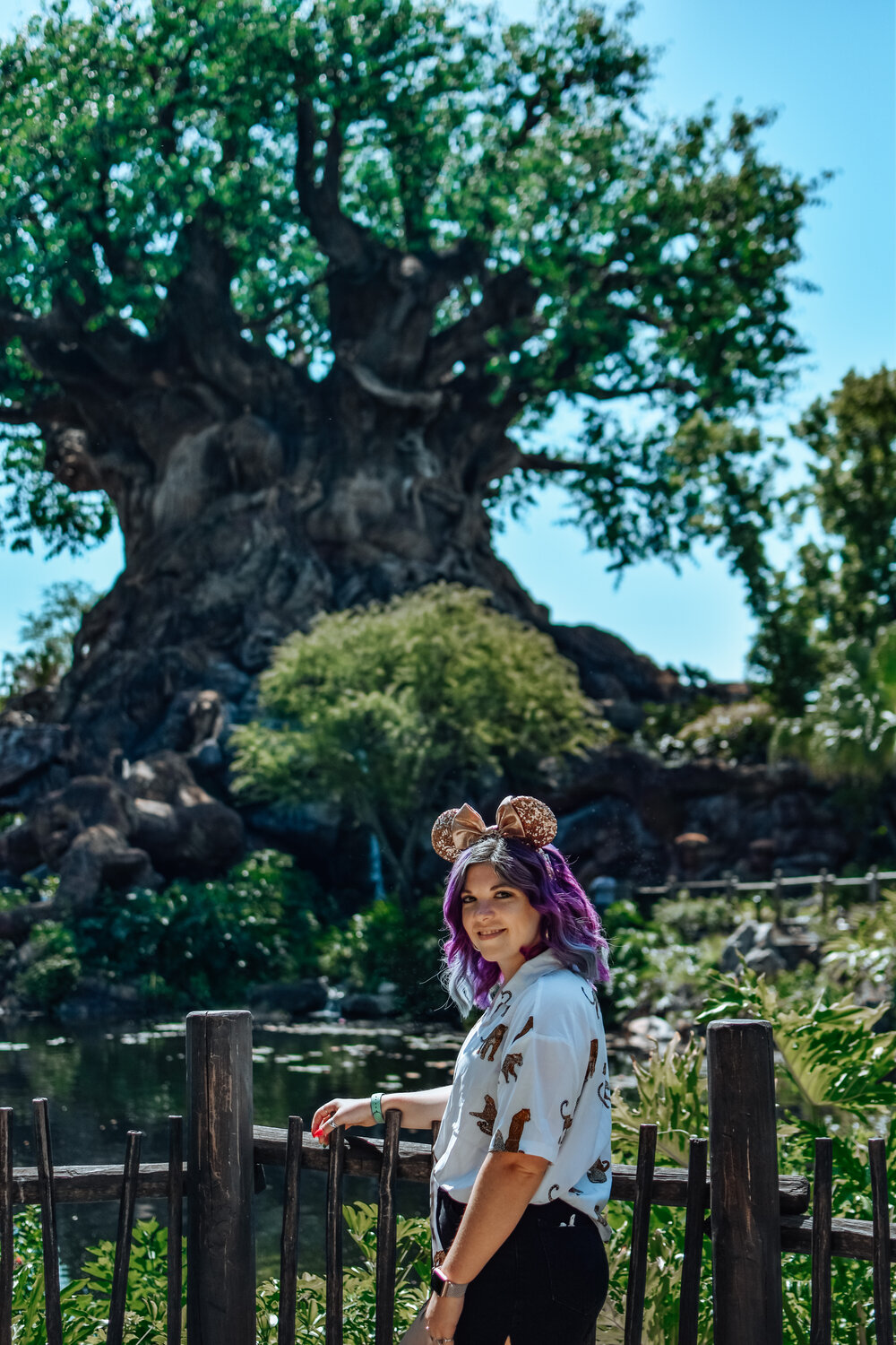 woman wearing animal ears headband for OUTFIT INSPIRATION FOR ANIMAL KINGDOM 