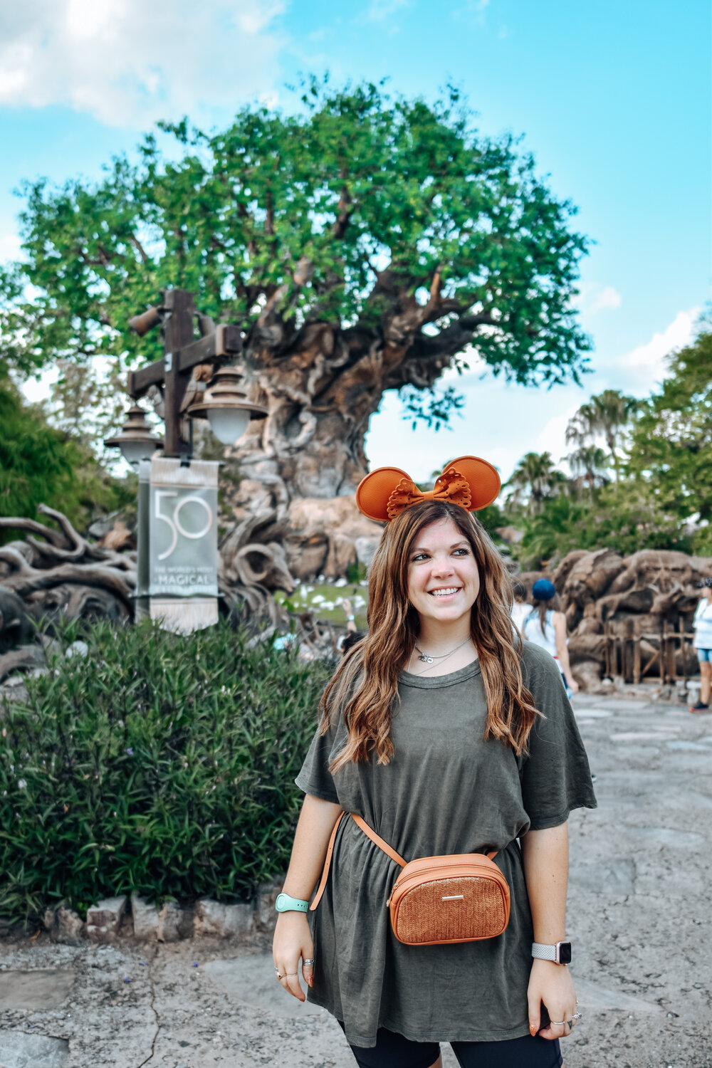 woman wearing shirt dress and animal ears headband 