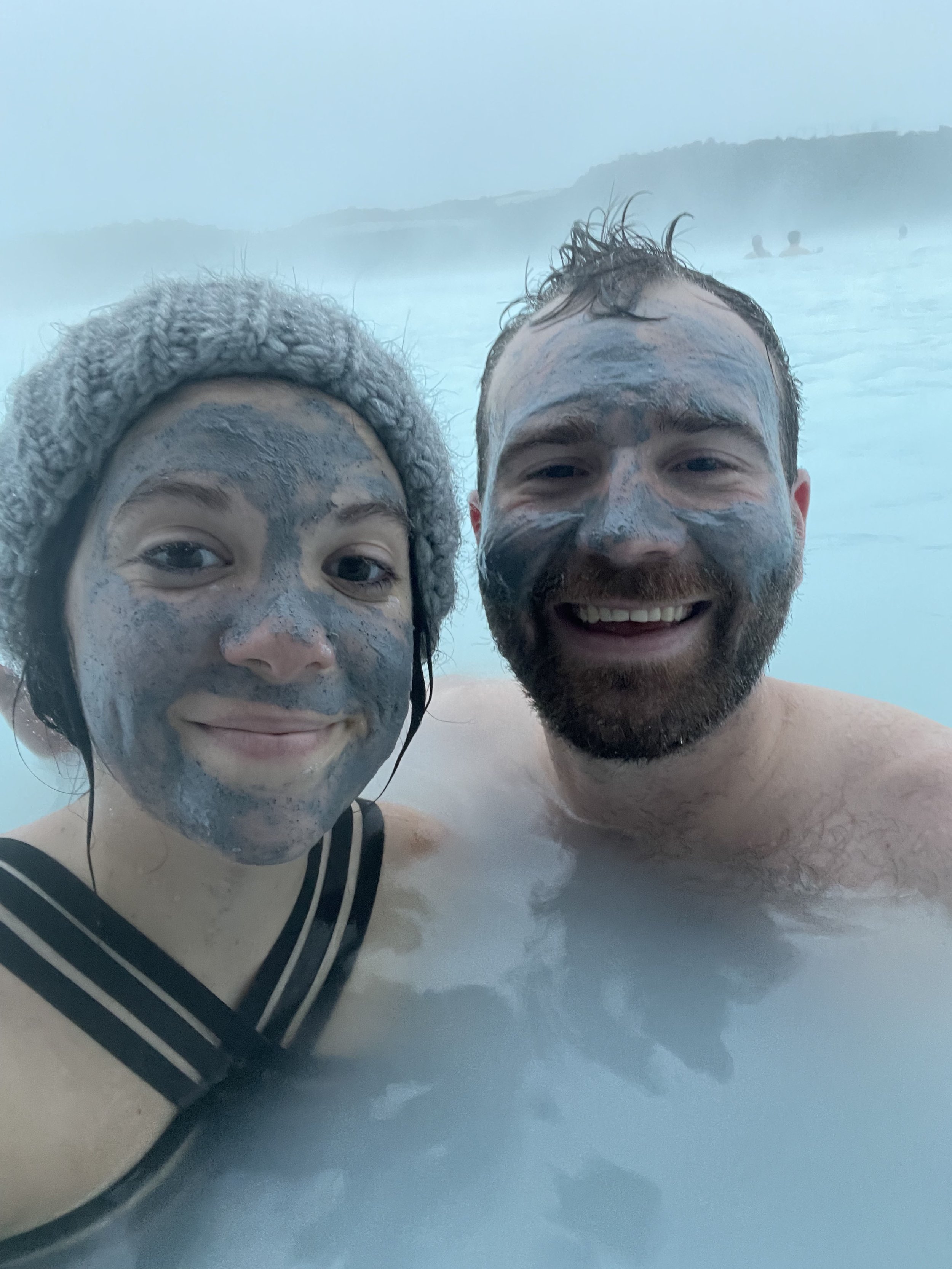 two people taking a dip at BLUE LAGOON IN ICELAND