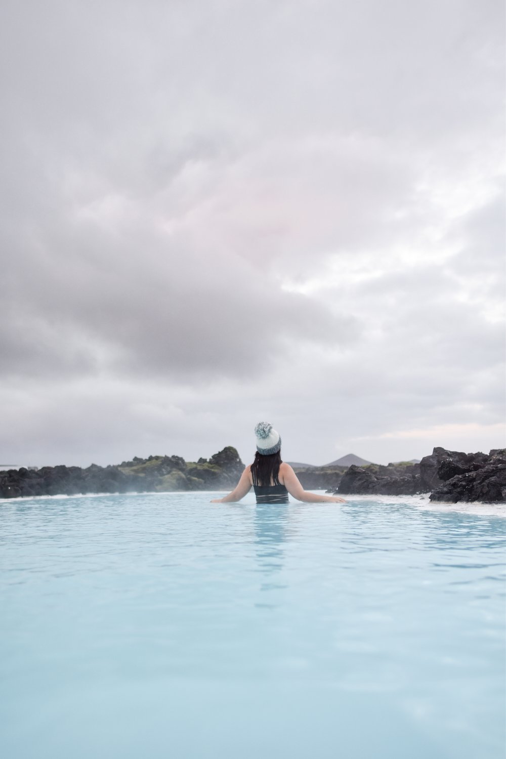 woman dipping at blue lagoon in SILICA HOTEL