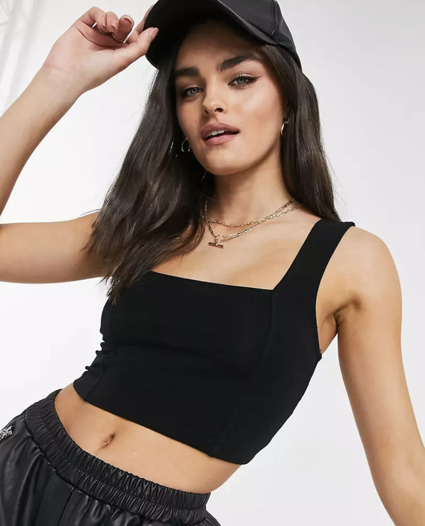 woman wearing black cropped top