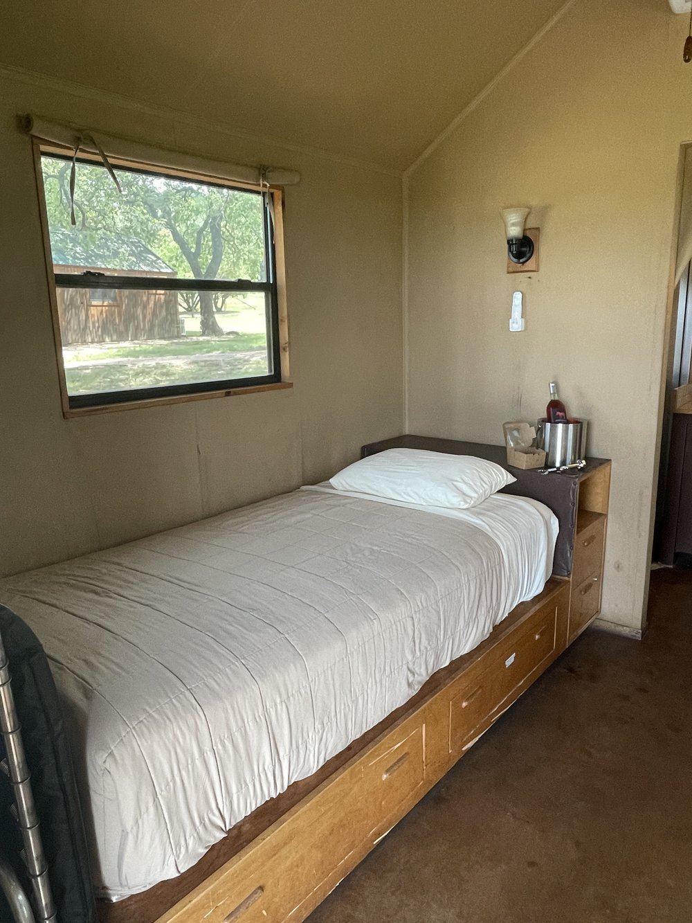 bed at THE FOOTHILLS SAFARI CAMP in one of the places to stay in glen rose tx