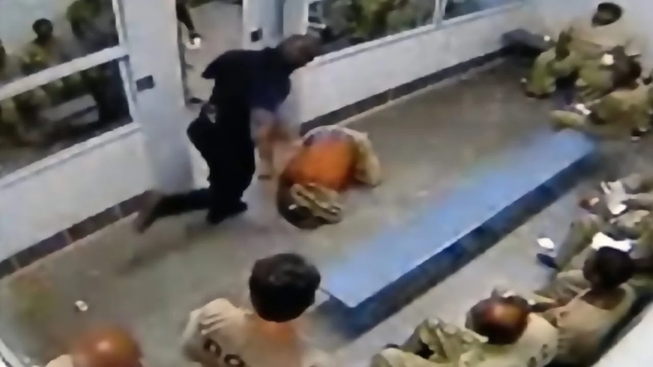 prisoner being beaten.jpg