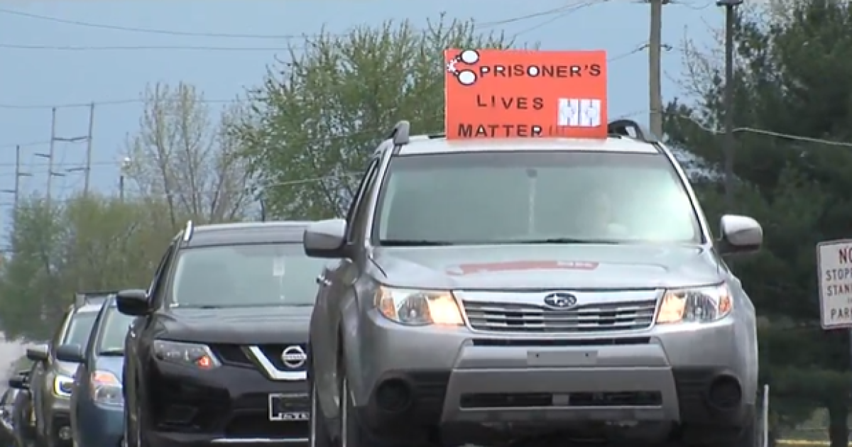 Image of the Free them All Coalition car demonstration at IWP on April 25, after which cells were unlocked for a period of time. As of May 4, cells were locked down again.