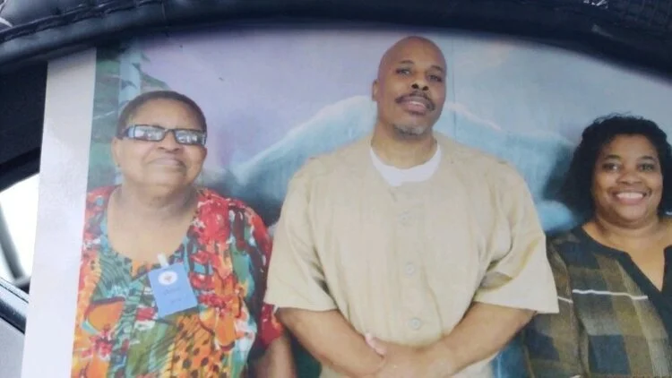 A recent photo of Balagoon, aka John Cole, with loved ones