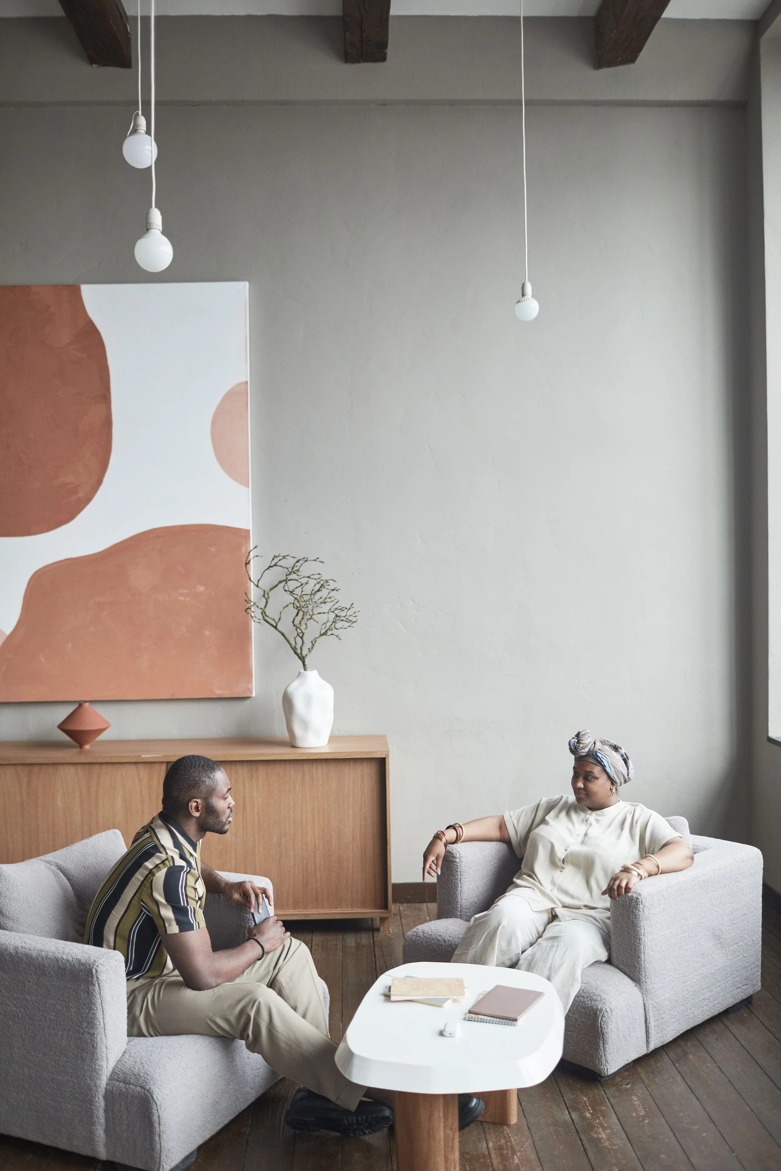 Christian counselor listening compassionately to a client during an anxiety counseling session in Houston