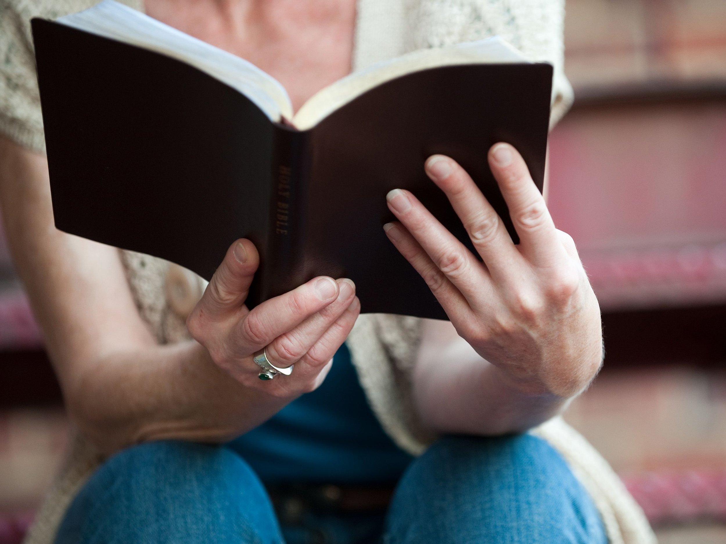 Woman in Houston TX reading her Bible in Church.jpg