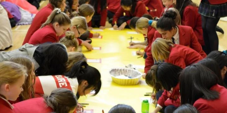 All-girls for the WIN: Local students inspired to help women in need