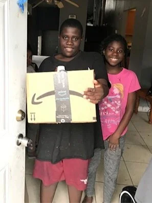 Happy Young Adults receiving a package