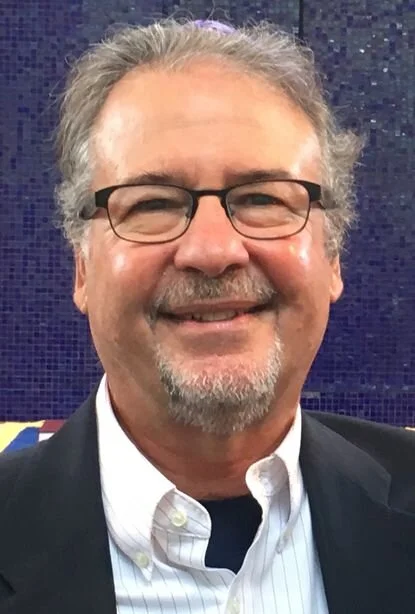 A Photo of Dennis Hetzel Smiling