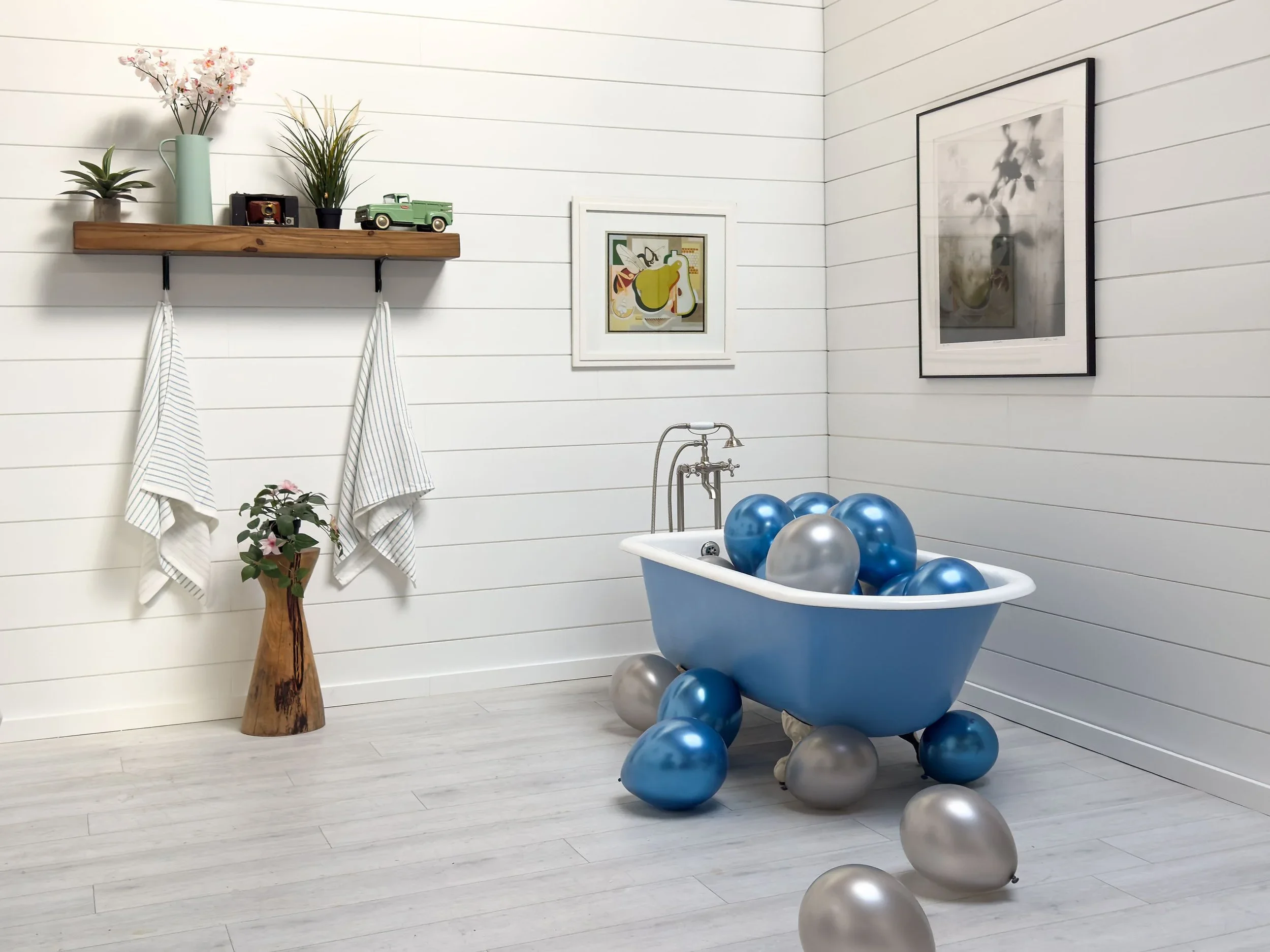 Blue Clawfoot Tub in White Shiplap Room