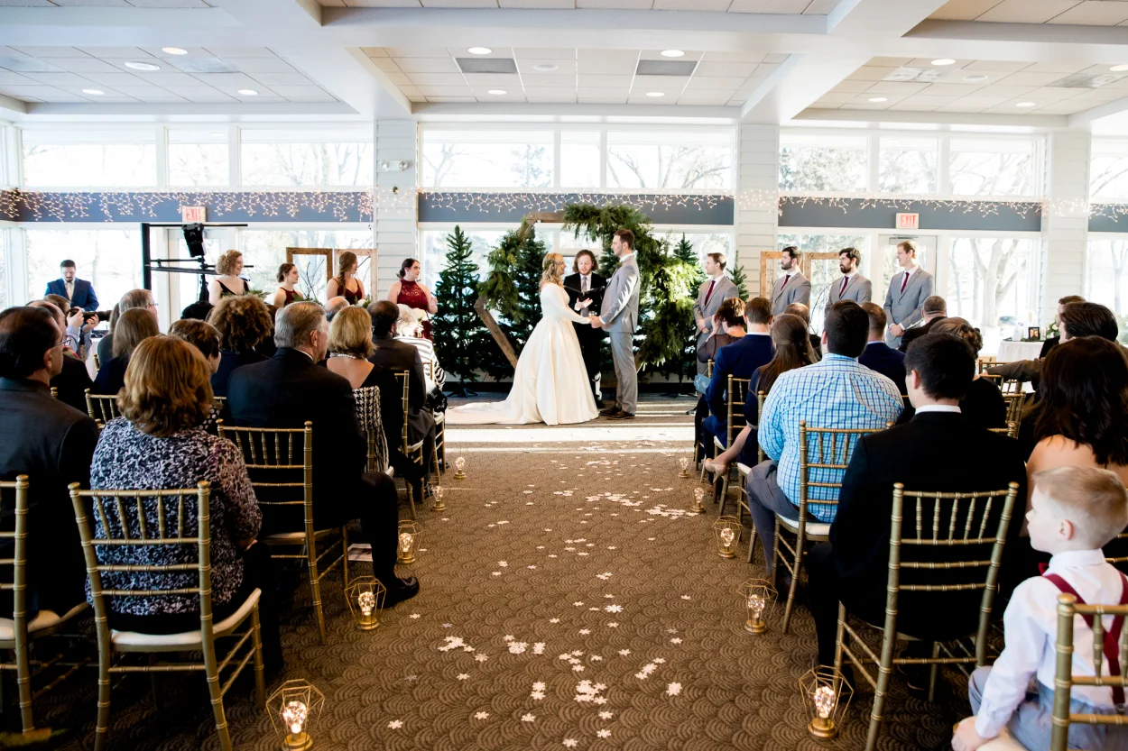 Fun fact, Sarah’s dad built the beautiful arch! We were very impressed! The greenery we added looked so amazing on it.