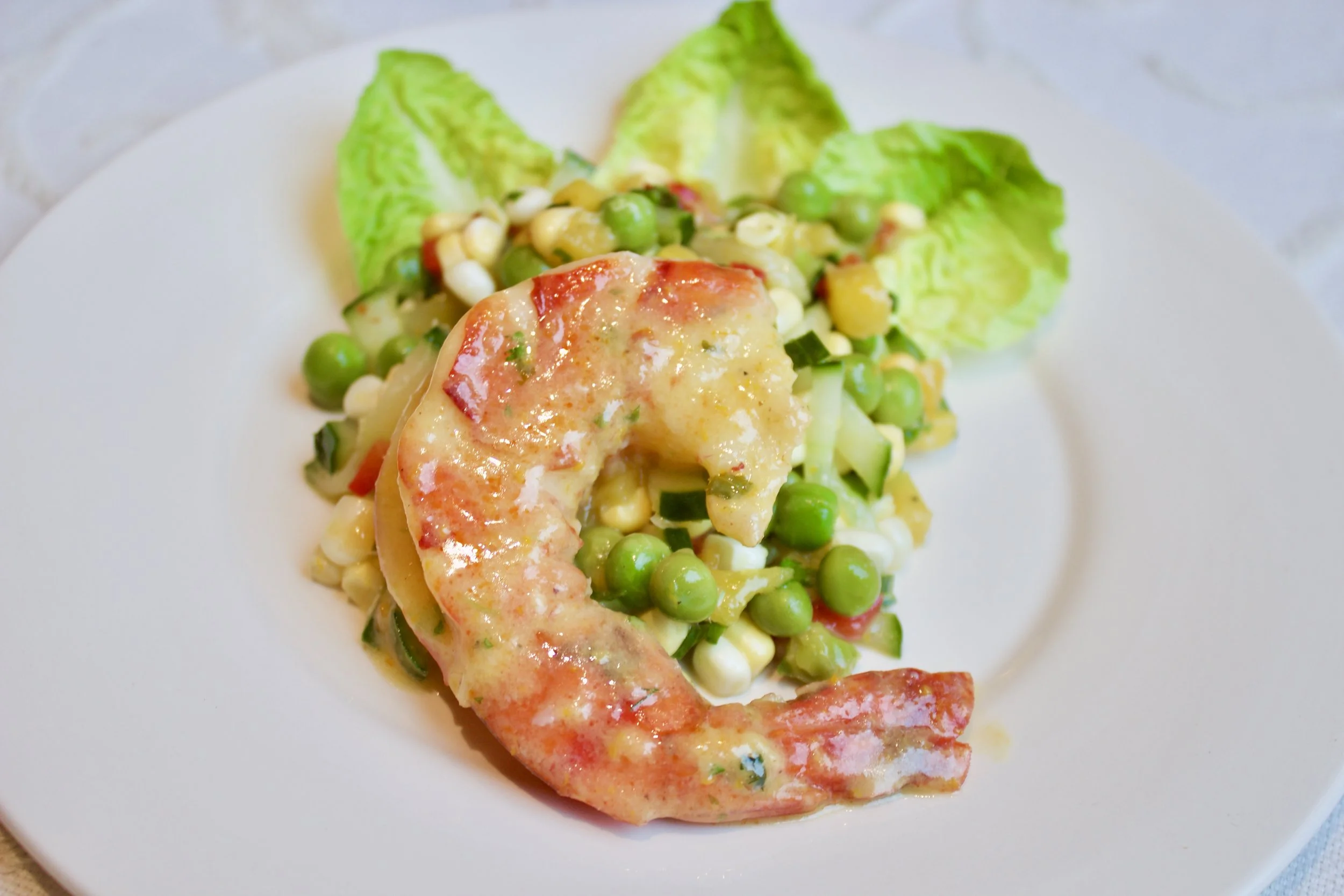 Colossal Shrimp on Fresh Corn + Pea Salad