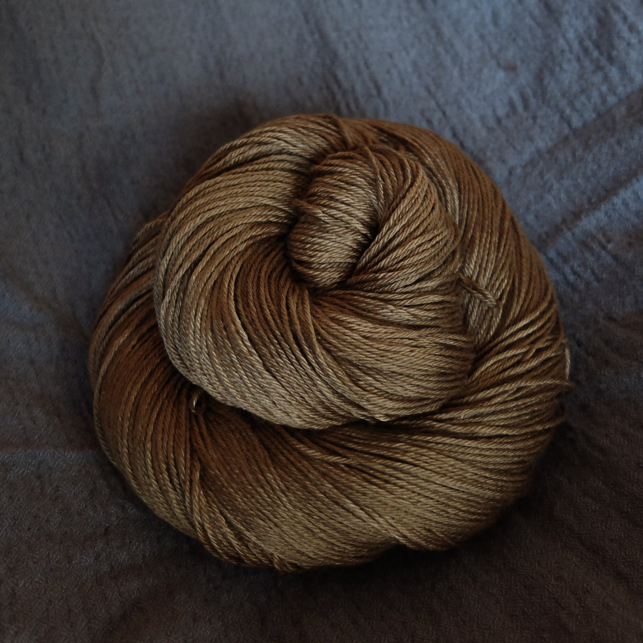 Dragon Gold on fingering - Merino/Silk Jeanette