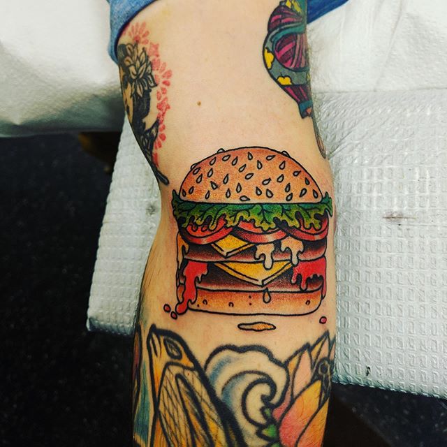 Shout to the homie @vidhyan for creating my cheeseburger, thanks to @marshallgarfieldbrown for making it indelible. #cheeseburgertattoo #justisjustwas