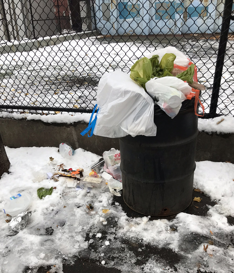 overflowing trash barrels not being emptied