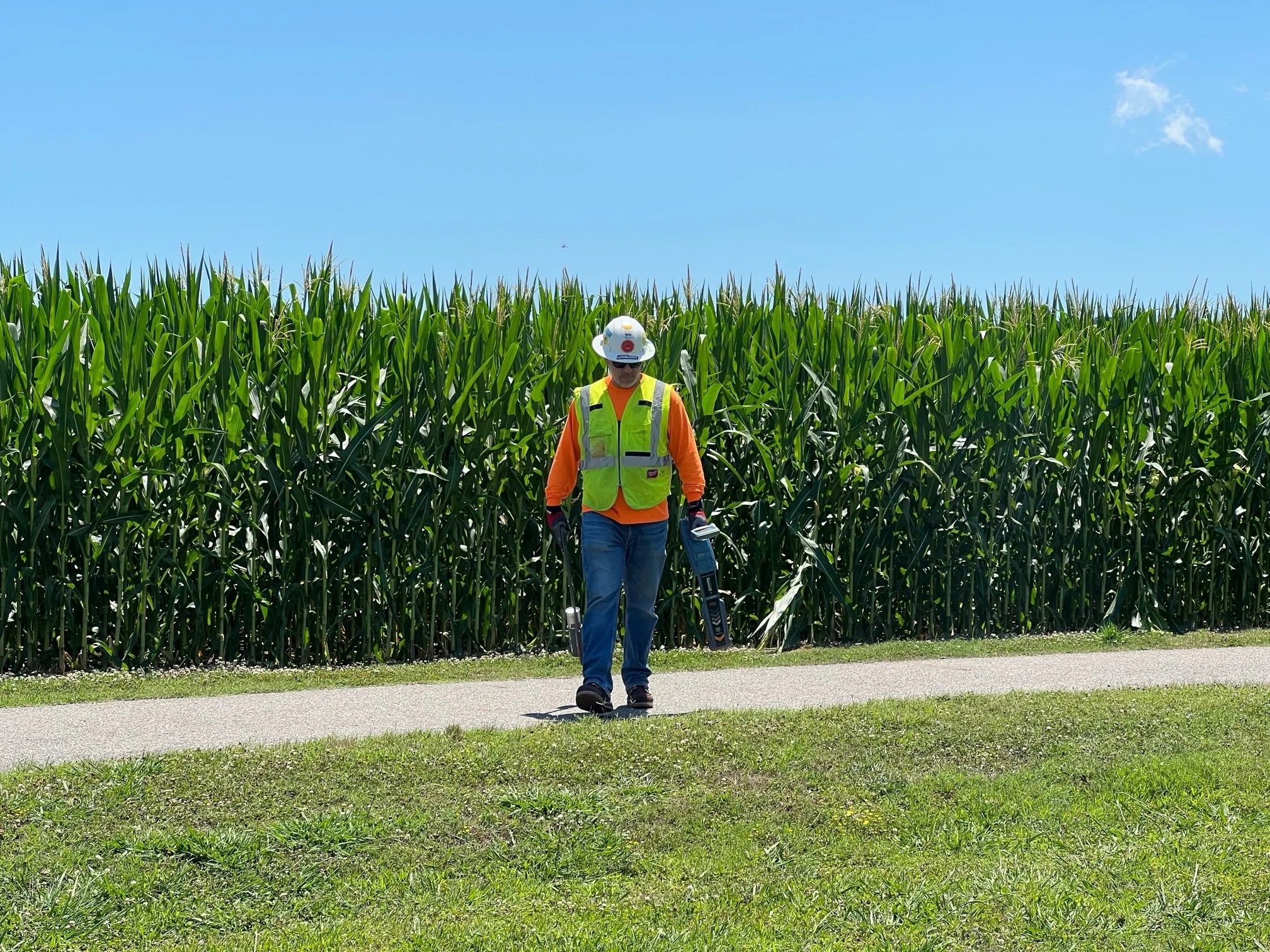 man locating underground utilities.jpeg